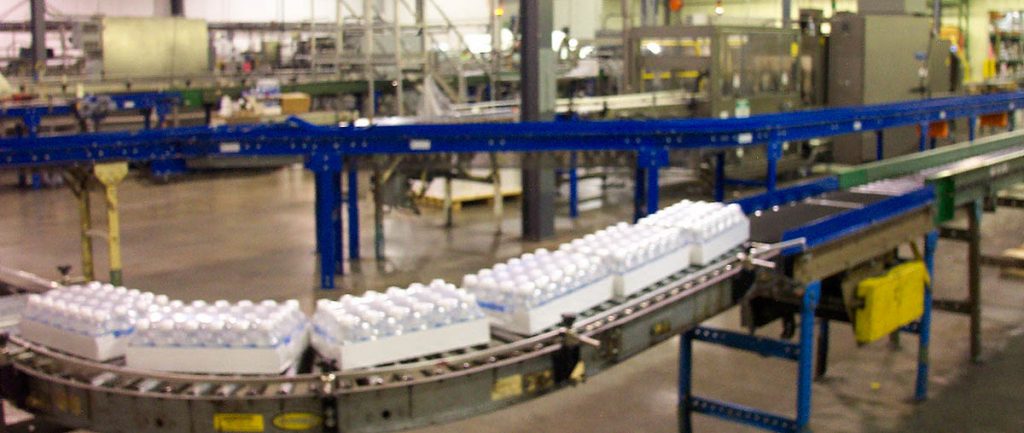 Food and Beverage Safety Programs — Beverages on a conveyor.